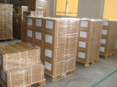 In cartons, and then in pallets, with packing film & belt